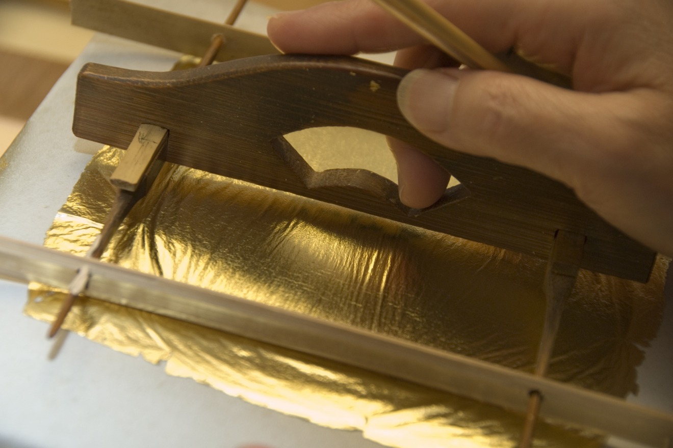 Bordeado con pan de oro