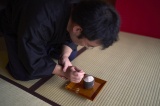 Mr Suzuoki preparing ash for the incense ceremony